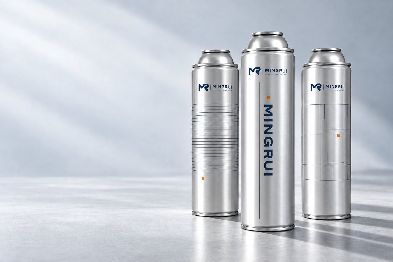 Three silver MINGRUI aerosol packaging concept cans with navy graphics